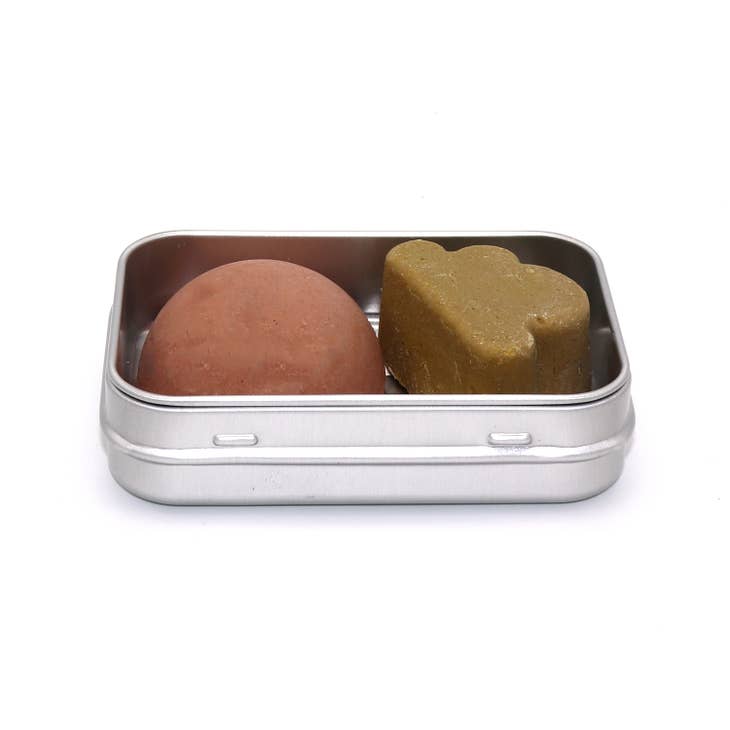 Aluminum Travel Soap Case, shown open with small soaps for size reference.