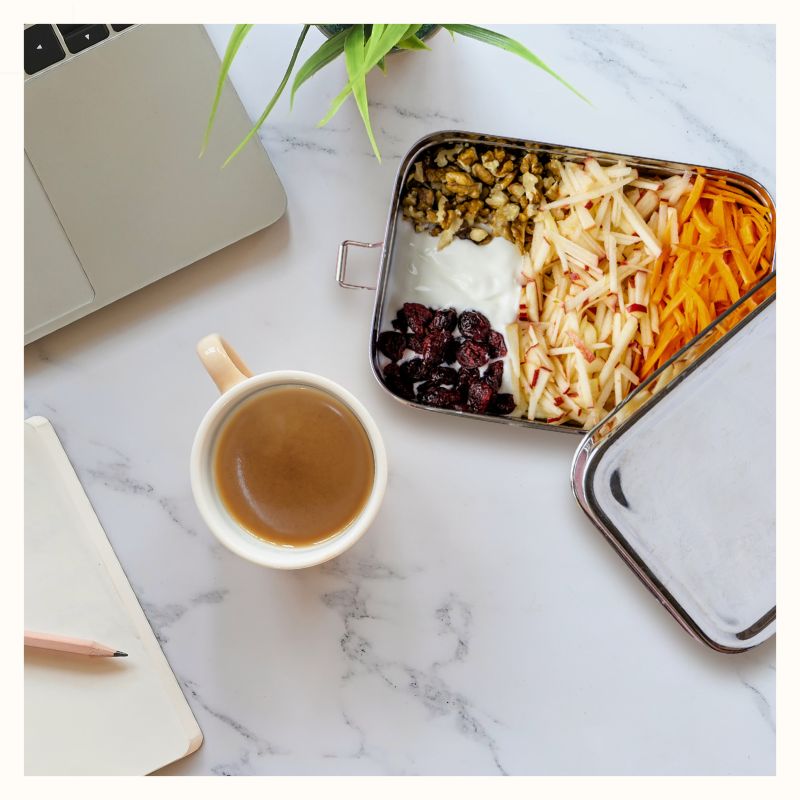 Large Bento Wet Box with food and coffee cup in work setting.