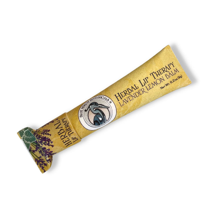 Blue Heron Botanical Lip Therapy Balms in Lavender Lemon formula, packaged in yellow compostable paper tube.