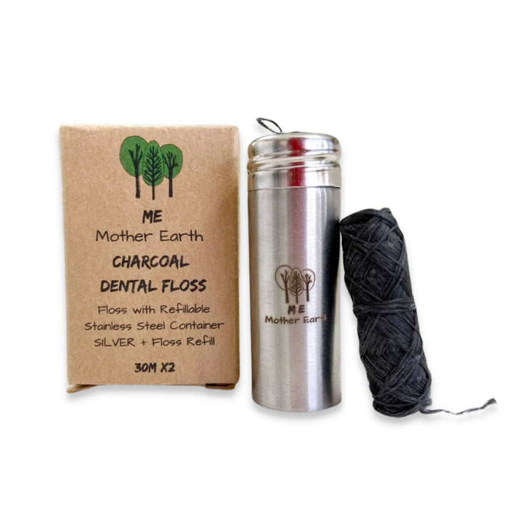 Charcoal Vegan Dental Floss with Stainless Steel Dispenser and Refill, Shown with Recyclable and Compostable Packaging.