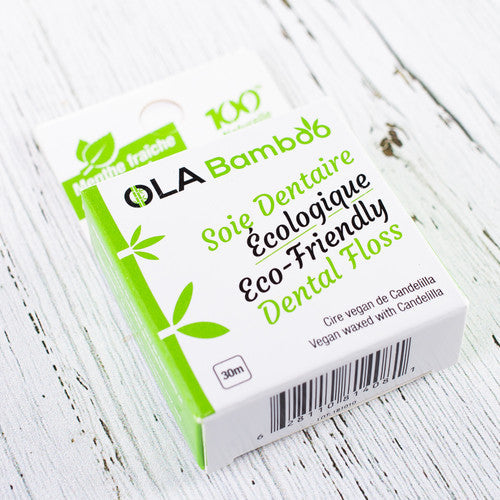 OLA Bamboo Eco Friendly Dental Floss In Cardboard Packaging.